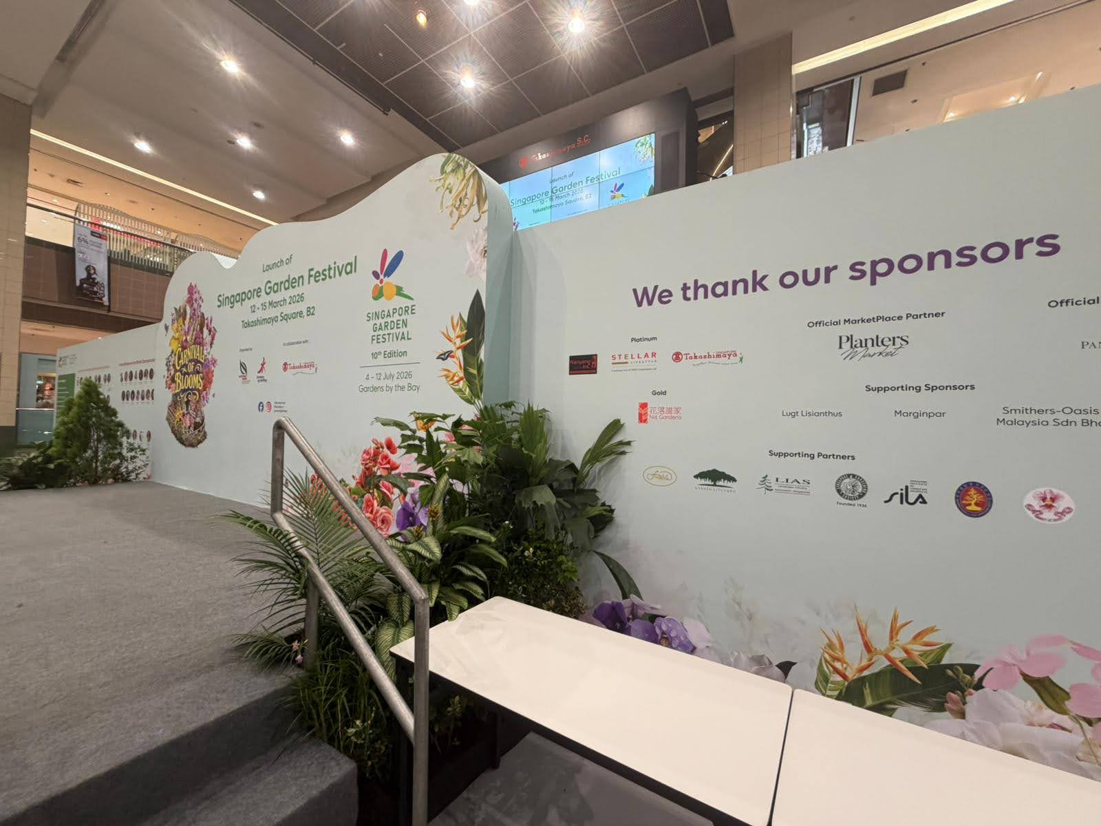 Singapore Garden Festival 2026 launch stage with Nanyang Inc’s sponsor logo on the backdrop.